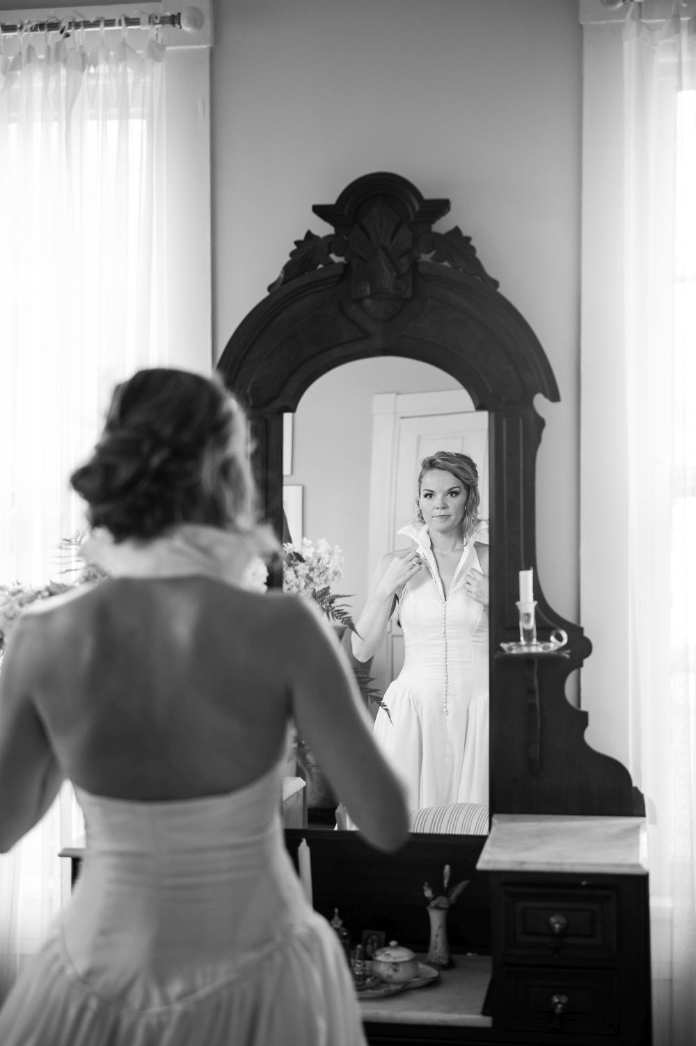 Bride looking in Mirror